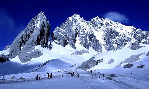 玉龙雪山在大理还是丽江_玉龙雪山在大理还是丽江有一个古镇